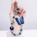Oppo Reno 15 5G Luxury Shimmer Airbag Butterfly Stand Case with Charm Strap