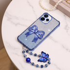 Oppo Reno 15 5G Luxury Shimmer Airbag Bow Stand Case with Charm Strap